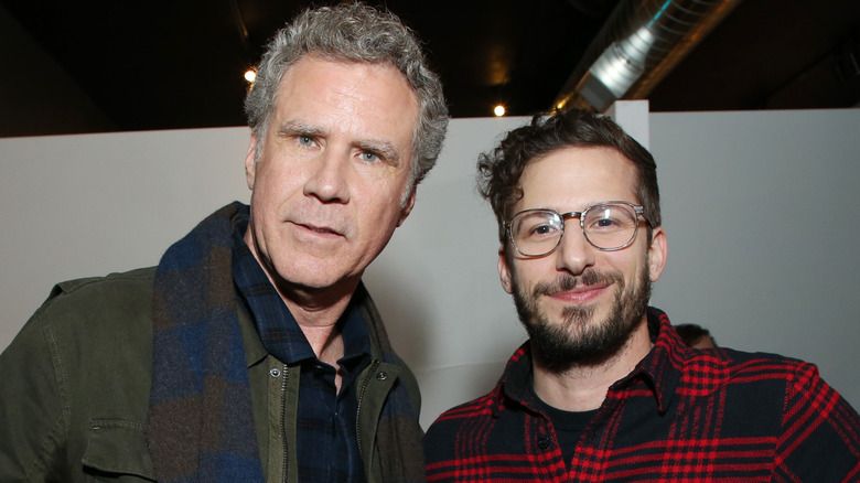 Will Ferrell a Andy Samberg se usmívají
