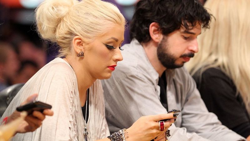 Christina Aguilera e Jordan Bratman no jogo sete das finais da NBA em 2010
